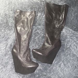 Wild pair silver snakeskin wedge boots